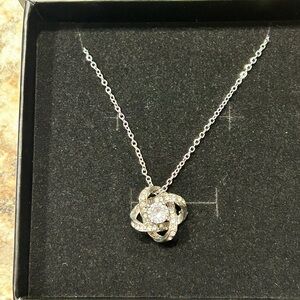 Silver Love Knot Pendant with Cubic Zirconia Stone